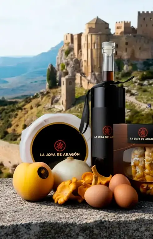 Bodegón de productos gourmet de Aragón con el Castillo de Loarre al fondo